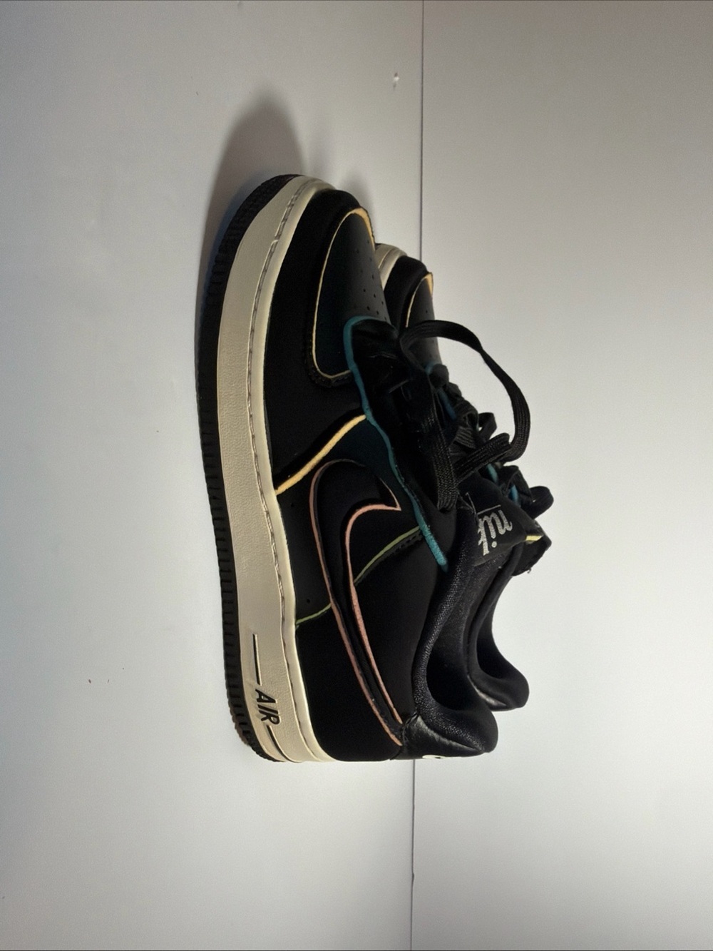 Nike Kids Black Sneakers with Pastel Multi-Accent Trim